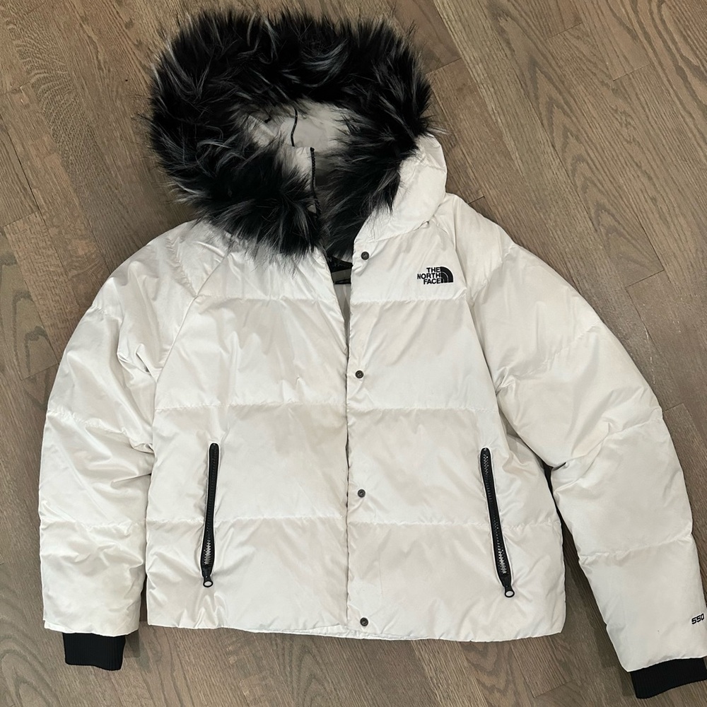 Women's North Face white 500 fill coat with fur hood.